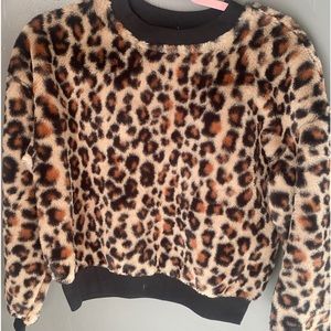 leopard sweater, size xsmall colors black, brown , cream color. Warm sweater.